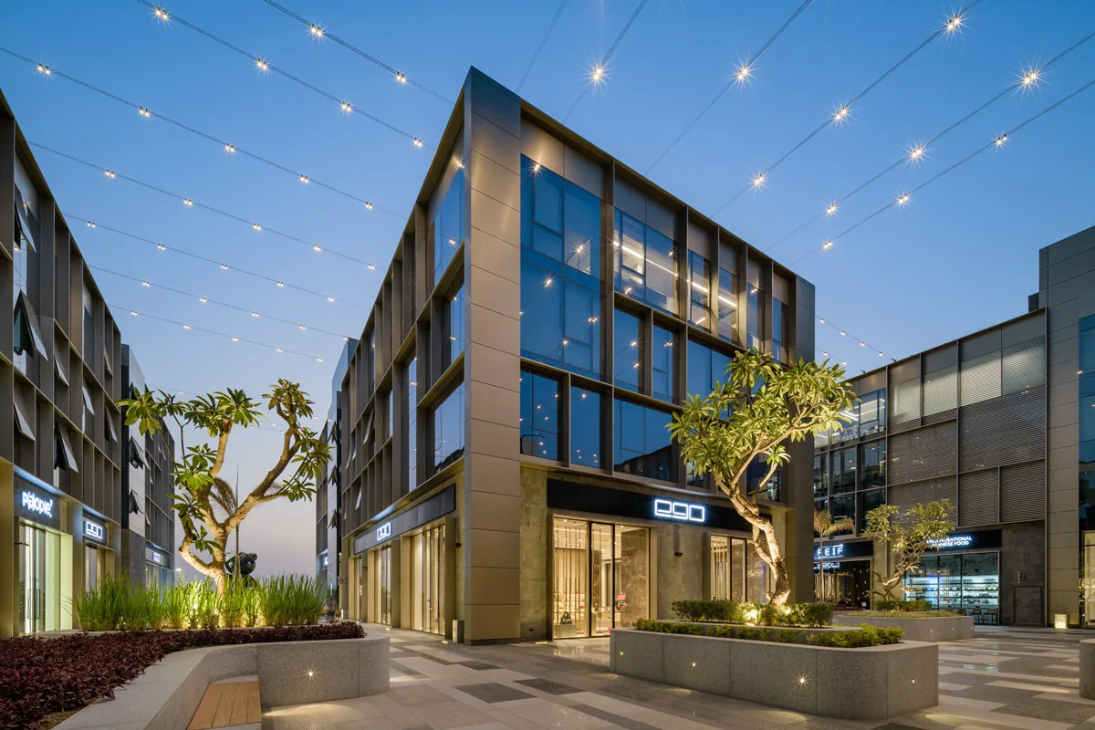 Retail architecture and landscaped walkways at 5A in New Cairo